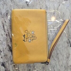 Yellow Wristlet Wallet with Cartoon Accent